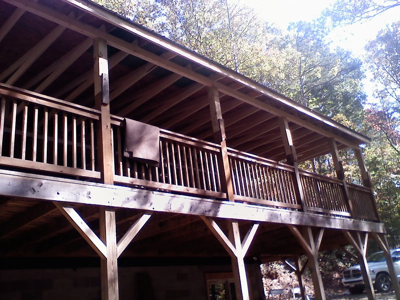 Timber framing under a new elevated porch and deck — Roof Leak Repair in Bradner by Roofing Brothers